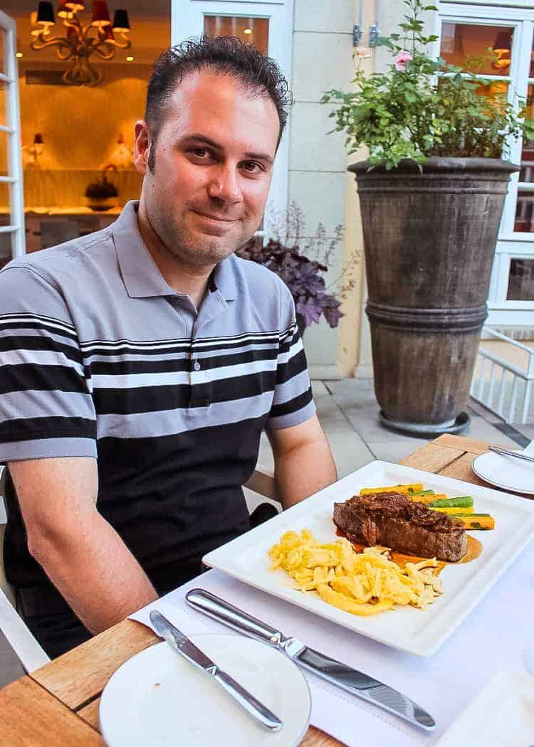John eating Steak and Spaetzle
