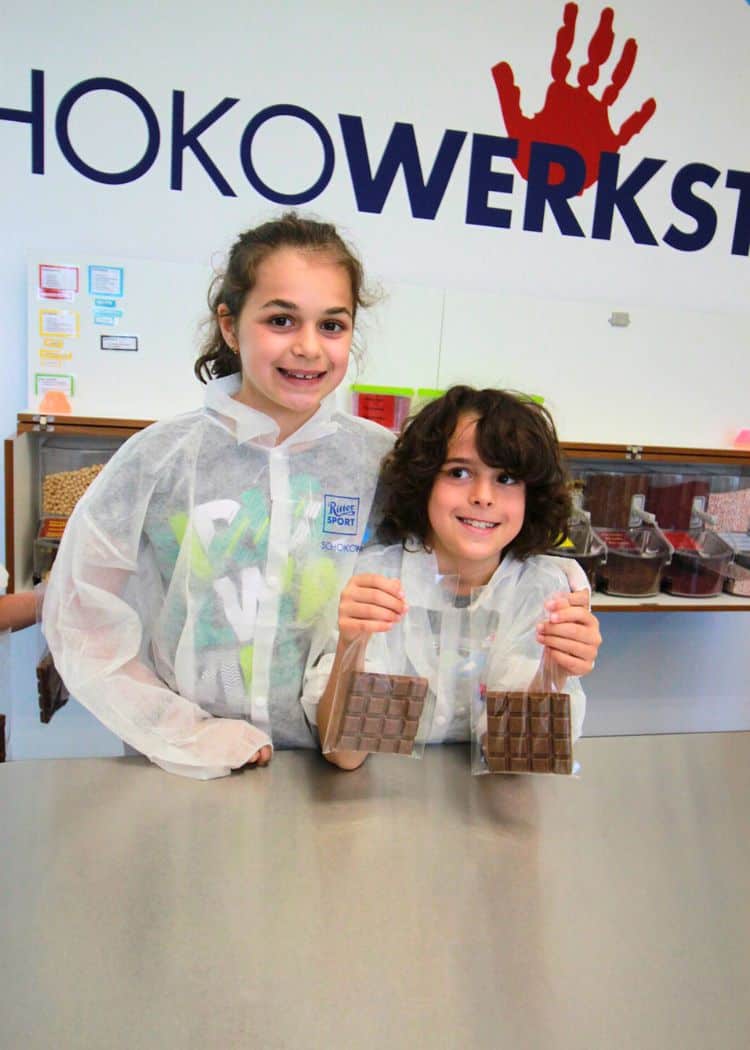 Ritter Sport Museum - Kids holding up the chocolate that they made