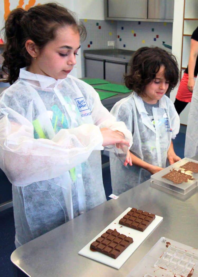 Kids making chocolate