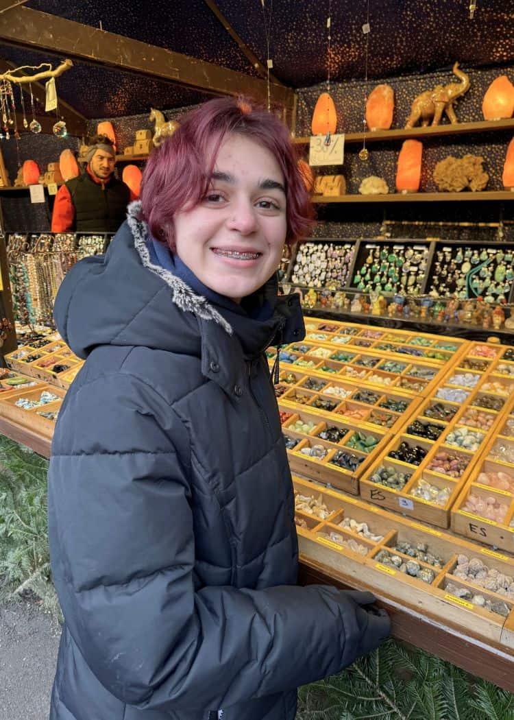 German Christmas Market Souvenirs - Daughter at stall selling crystals and handmade jewellery