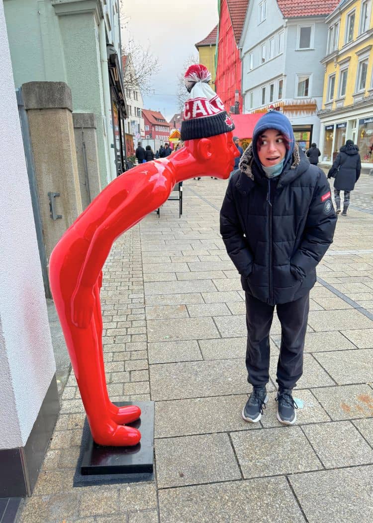 Reutlingen Christmas Market - Red Man statue with daughter