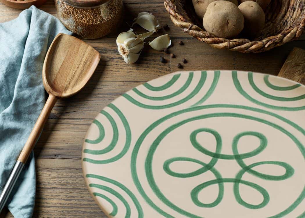 Austria - Green swirl plate on rustic table