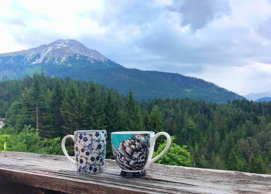 Coffee mugs with the Austrian Alps in the Background
