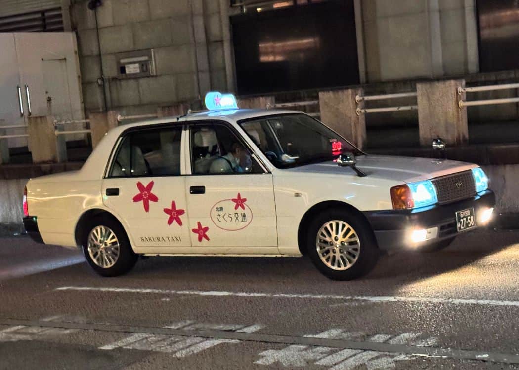 Sakura Taxi at night