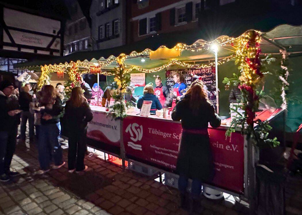 Tubingen - Gluhwein and crepe stand supporting a swim club